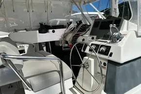Helm of 2021 Leopard 50 yacht with steering wheel and navigation controls.