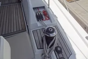 Beneteau Oceanis 46.1 2020 sailboat deck with winch and control lines.