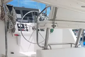 Interior view of a 2017 Leopard 48 yacht with white steps and control panel.