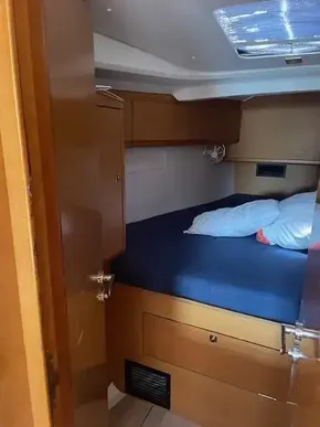 2017 Jeanneau Sun Odyssey 519 cabin with bed and storage compartments.