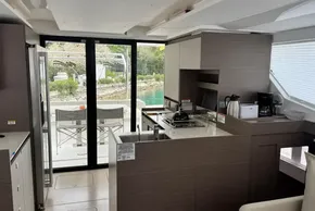 Modern kitchen interior of 2024 Leopard 40 Powercat yacht with sleek design and appliances.